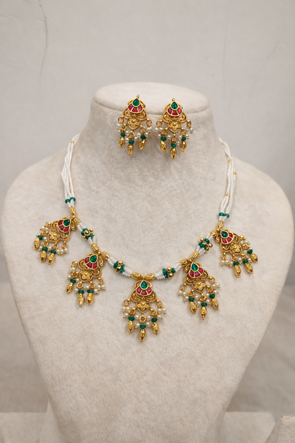 Elegant Gold-Toned Pearl and Kundan Necklace with Earrings