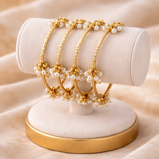 Set of 4 Gold-Plated Twisted Kashmiri Bangles with Pearl Cluster Ghungroo Charms