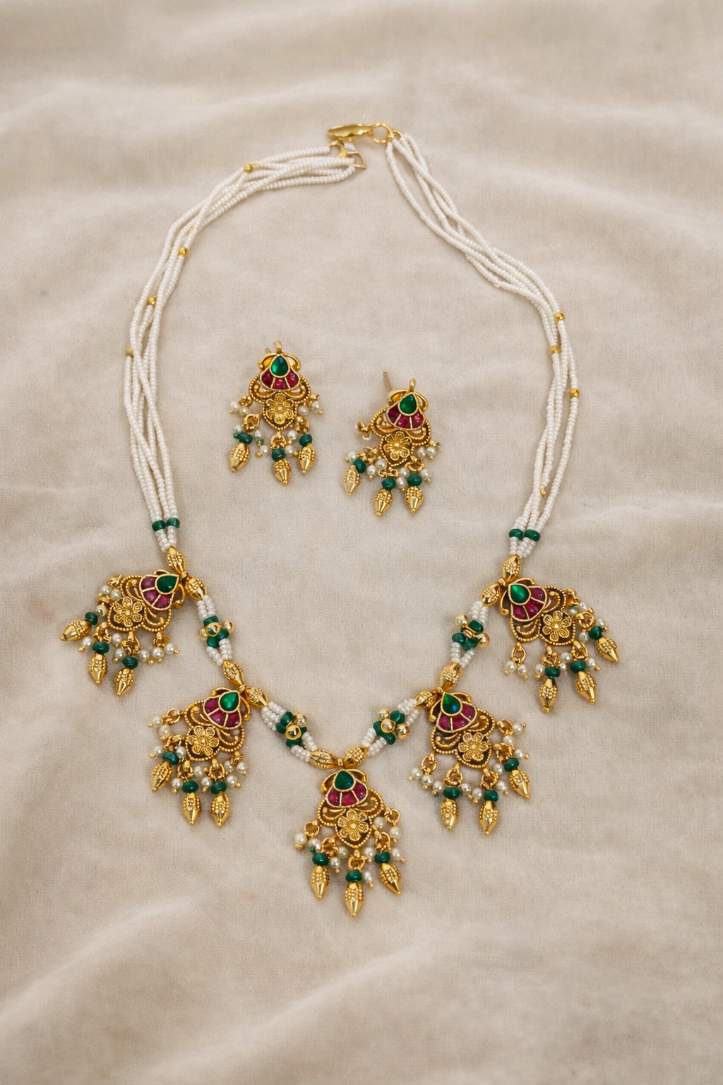 Elegant Gold-Toned Pearl and Kundan Necklace with Earrings