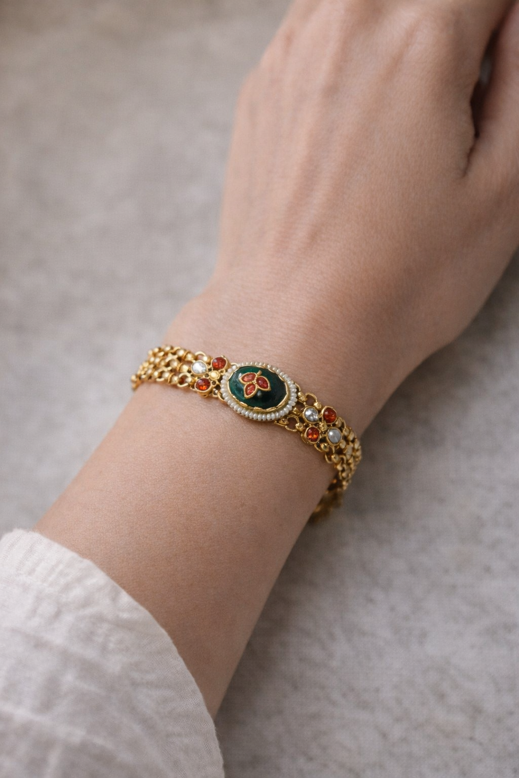 Golden Toned Cuff Bracelet with Green Onyx Stones