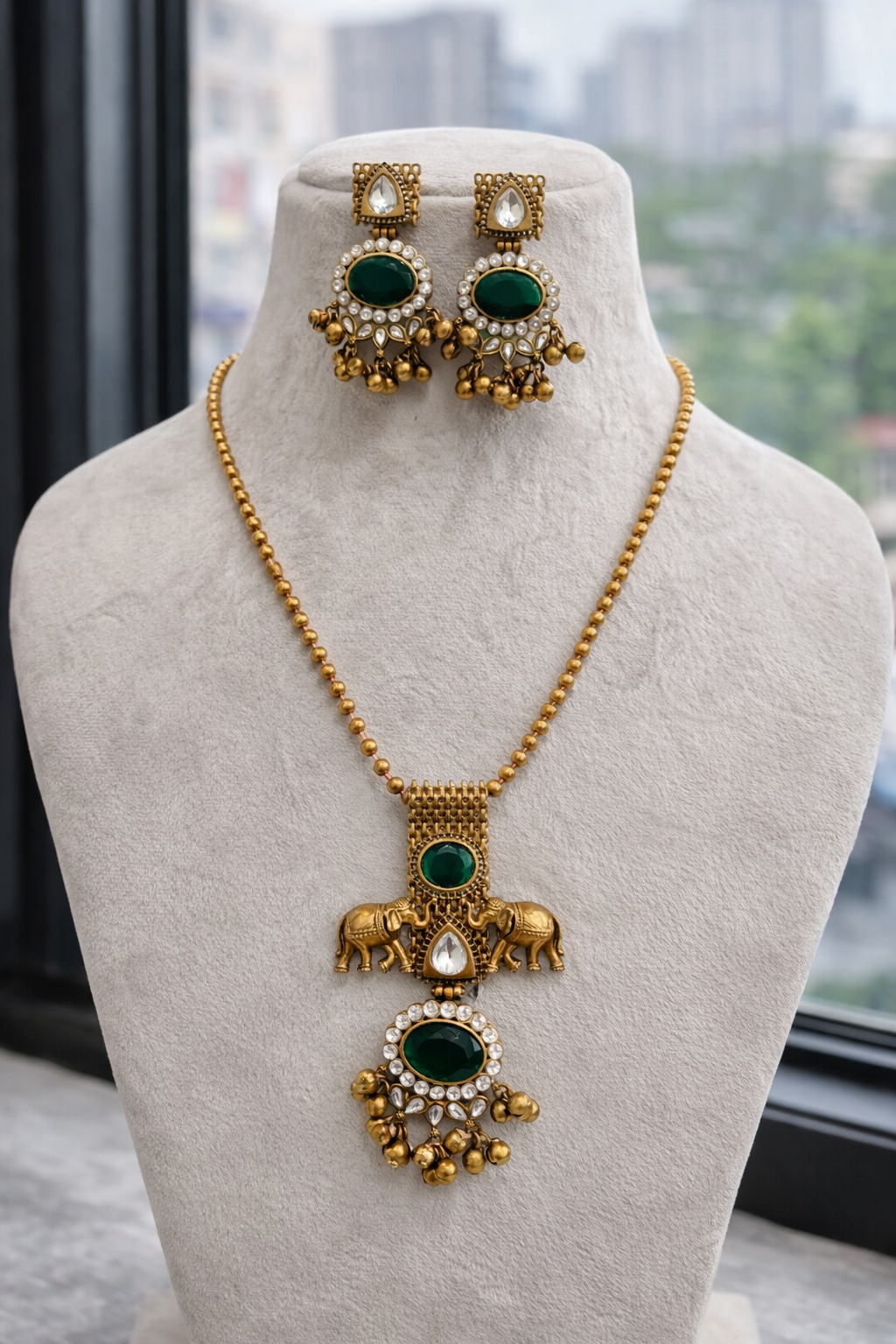 Emerald Elegance" Elephant Motif Gold-Toned Pendent Set-G351500