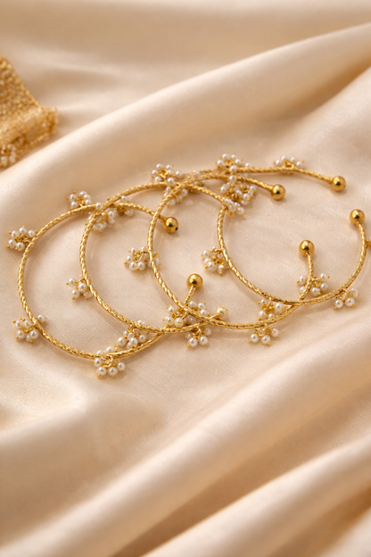 Set of 4 Gold-Plated Twisted Kashmiri Bangles with Pearl Cluster Ghungroo Charms