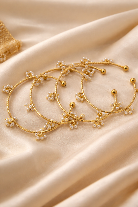 Set of 4 Gold-Plated Twisted Kashmiri Bangles with Pearl Cluster Ghungroo Charms